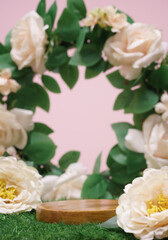 wood podium beige rose flowers on pink pastel background with space.beauty cosmetic skin care advertising stage,luxury romantic love valentines or mother gift, product pedestal platform stand display.