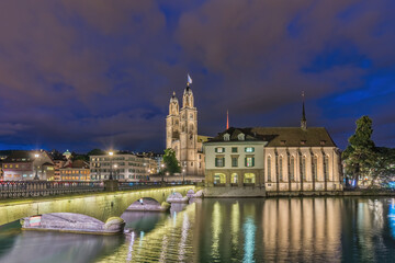 Zurich Switzerland, night city skyline at Grossmunster Church and Munster Bridge