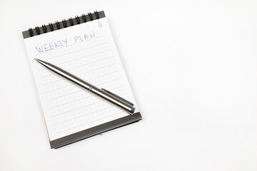 Weekly plan notes with metal pen - Productivity plan - Business and self improvement