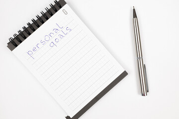 Goals 2023 plan notes with metal pen - Productivity plan - Business and self improvement