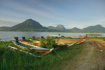 Fishing boats anchored at the Jatiluhur reservoir. Beautiful view of Jatiluhur reservoir with...