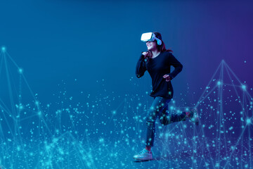 Metaverse technology concept. Young Asian woman wearing VR headset with experience playing video...