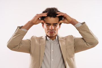 Image of tired  businessman having headache.