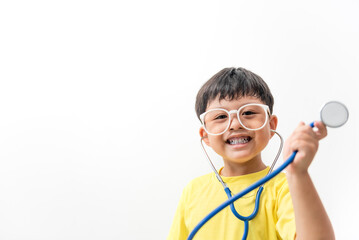 Asian child with stethoscope and a smile against a white background.