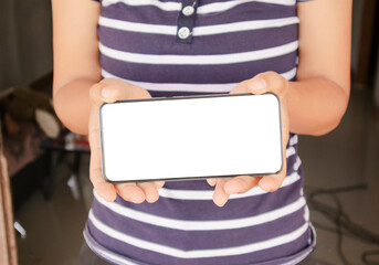 woman holding a smartphone blank white screen Focus on the foreground