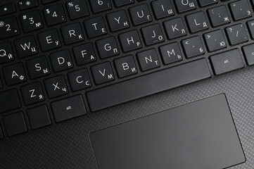 Closeup keyboard of modern laptop, for backgrounds or textures