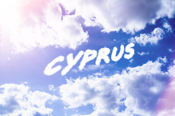Cyprus. Text from clouds in sky in bright sunlight.