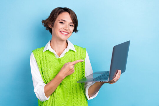 Photo of positive programmer python coder developer direct finger her new website advertisement formal uniform isolated on blue color background