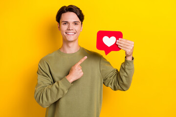 Photo of positive attractive man blogger wear khaki stylish clothes arm demonstrate social media...