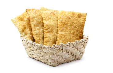 Brazilian pastry, typical fried salty stuffed with ground beef, sauce and pepper, typical brazilian salt, served in bakeries, bars and restaurants, isolated white background, copy space