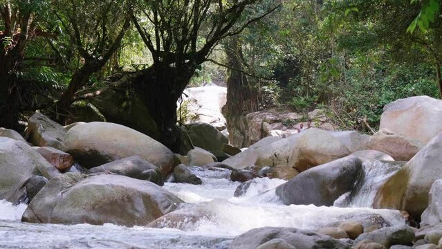 Water Flows Through Rocks in the Pristine Nus River