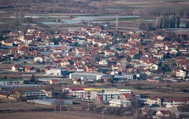 Strumica, Macedonia - February 2, 2023: Top view of the city. Buildings with red roofs. Urban landscape. A city in North Macedonia.