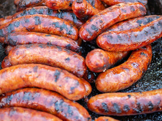 Fresh juicy grilled pork and beef sausages