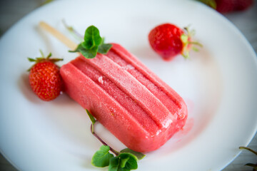 cooked homemade strawberry ice cream on a stick