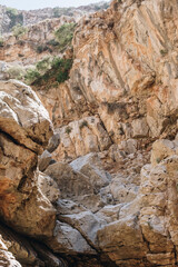 Fototapeta na wymiar Steep hill as seen from the bottom of canyon