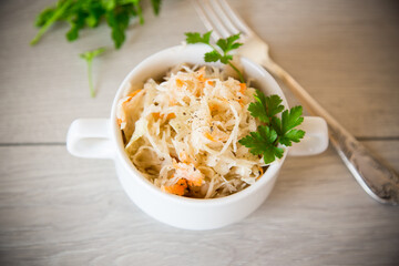 sauerkraut with carrots and spices in a bowl
