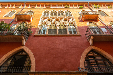 Facade and details of the fifteenth-century palace in historic centre of medieval town of Verona -...
