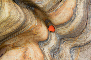 Colourful Pebble on Sandstone Geology at Spittal beach, Abstract Photograph, Northumberland stock photo