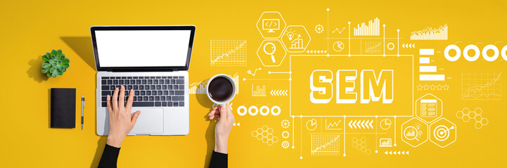 SEM - Search Engine Marketing theme with person using a laptop computer