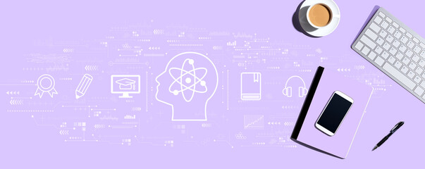 Online education concept with a computer keyboard and office items