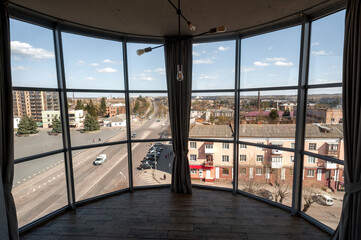 Large panoramic windows in the cafe with a view of the city