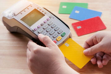 Credit card payment with EDC machine or credit card terminal.