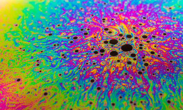 Multicolor psychedelic colors in a soap bubble