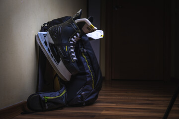 Skates hanging on a backpack