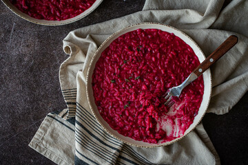 Homemade beetroot risotto with thyme 