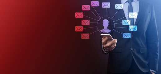 Male hand holding letter icon,email icons .Contact us by newsletter email and protect your personal...