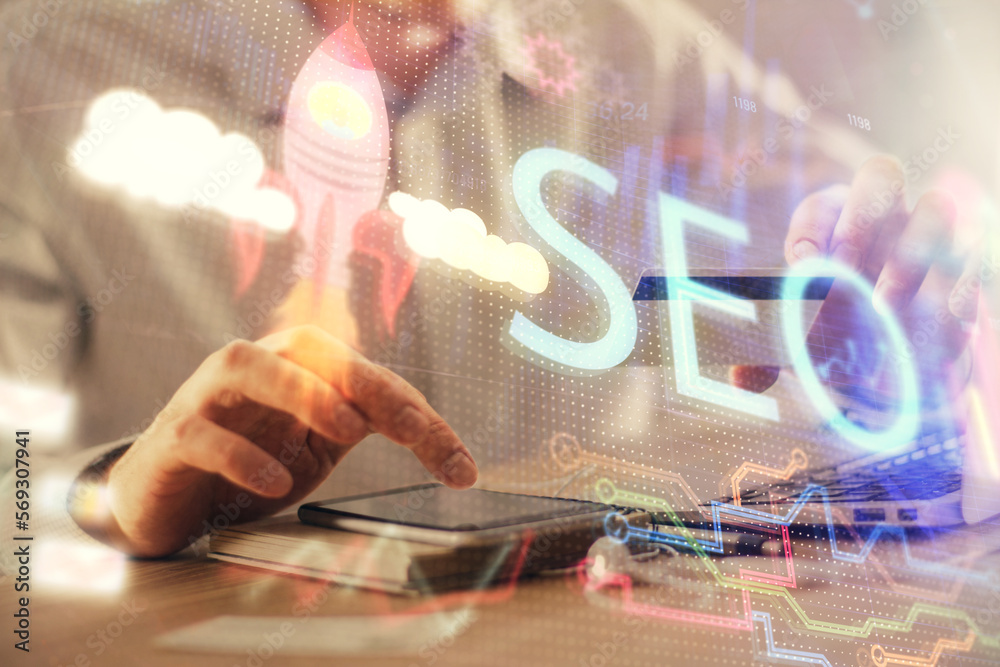 Aufkleber double exposure of man hands holding a credit card and seo drawing. search engine optimization in in