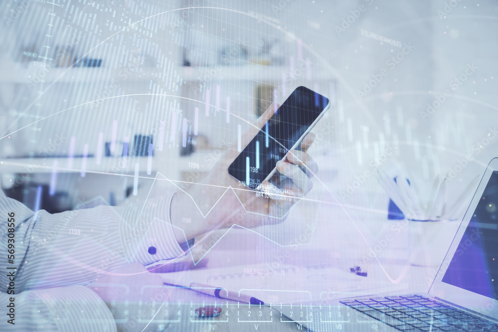 Poster double exposure of man's hands holding and using a digital device and forex graph drawing. financial