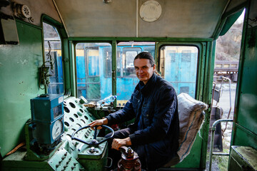Engine train driver inside of locomotive control room