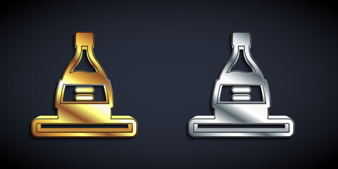 Gold and silver Bottle of sake icon isolated on black background. Long shadow style. Vector