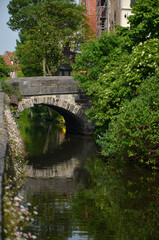 Fototapeta premium Stone bridge on a canal in Bruges