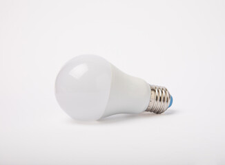 LED lamp isolated on white background. Economic lamp.