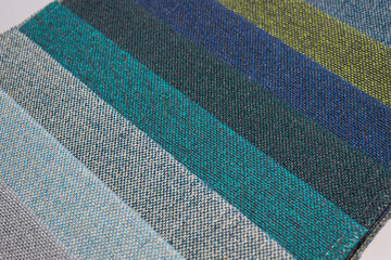 Close up to a rolled up upholstery samples