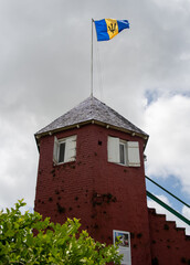 The Barbadian flag flying above Gun Hill Signal Station - 569328938