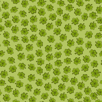 St Patricks Day pattern with clover and shamrocks in cartoon style on green background for print