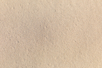 Fototapeta na wymiar background of fine sand at the beach