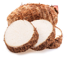 Eddoe or taro tubers and its slices isolated on white background.