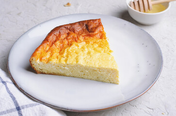 Cottage Cheese Casserole, Delicious Homemade Baked Dessert on Grey background