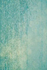 turquoise and gold textured background