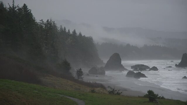 Stunning observation deck with cinematic vistas of stormy Oregon shores. Hiking trails with scenic views for adventurous travel destination. High quality 4k footage