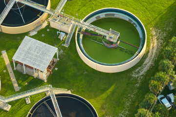 Aerial view of modern water cleaning facility at urban wastewater treatment plant. Purification...