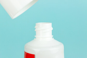 Toothpaste white tube, hygiene health care. Concept of oral hygiene in the family. Toothpaste tube close-up. Close-up toothpaste tube dental hygiene.