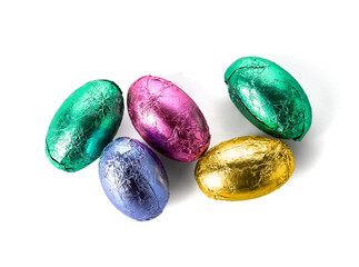 Easter eggs in foil on white background