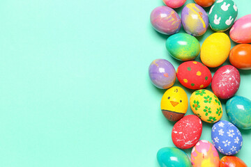 Fototapeta na wymiar Many colorful Easter eggs on color background