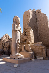 Ramses statue in Luxor Temple on a sunny day.