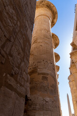 Columns of the Karnak temple in Luxor, without people and on a sunny day.